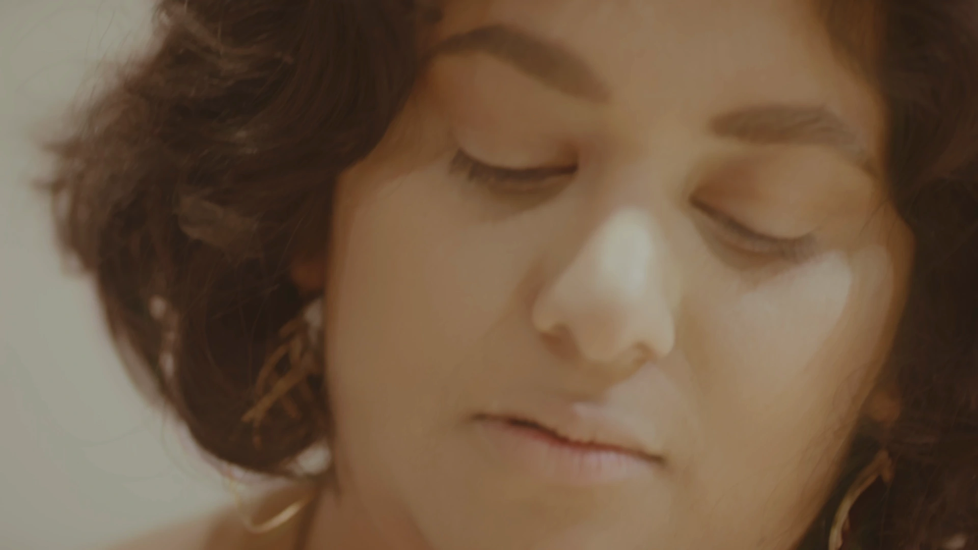 Selected frame from Connected. Close-up of performer Trisha Gupta.