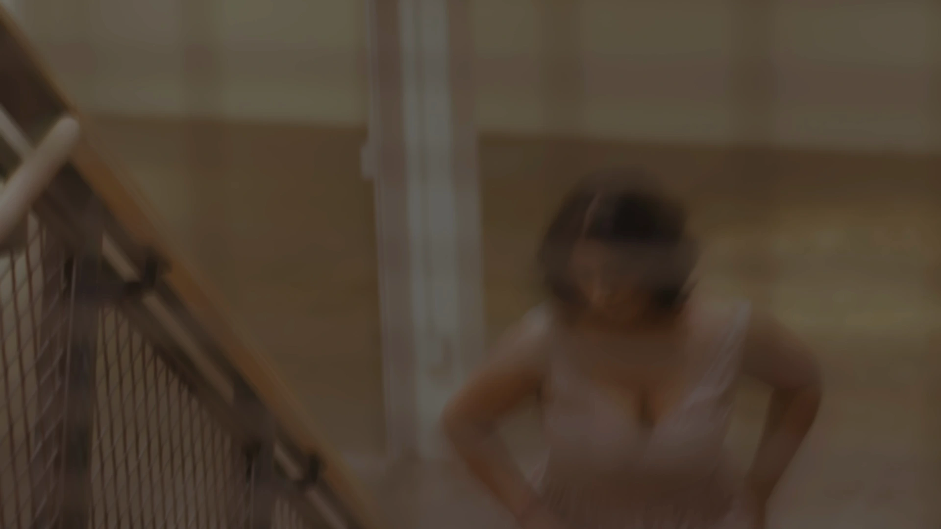 Selected frame from Connected. Movement beside the staircase.