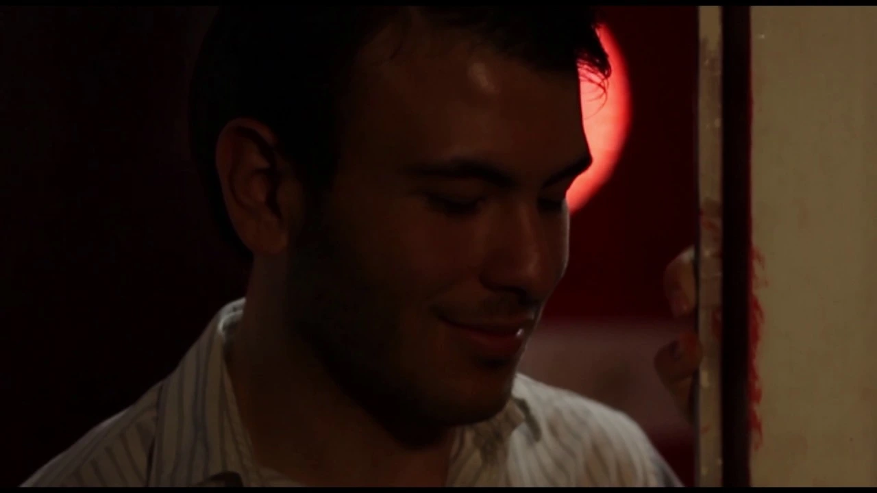 Red-lit doorway scene from the remake exercise. · In the Mood for Love — Remake Exercise