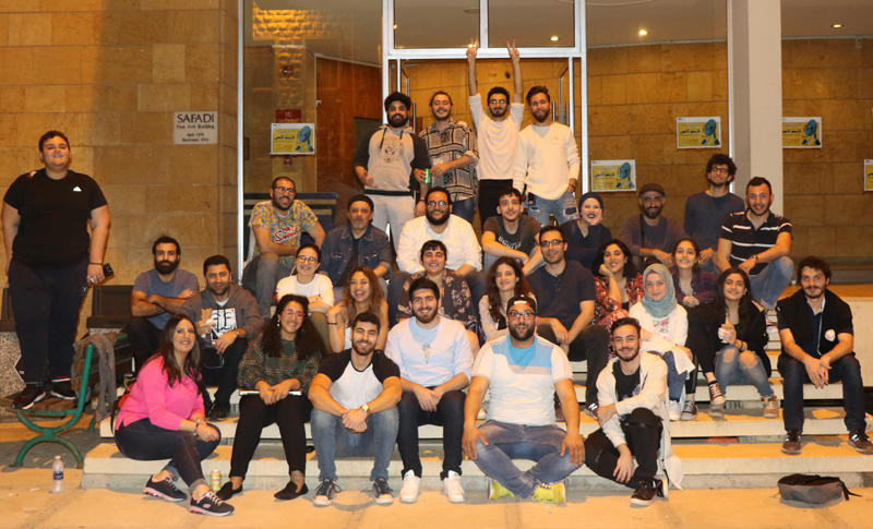 The Casino el-Ons production team gathered on the steps outside the Safadi Fine Arts building.