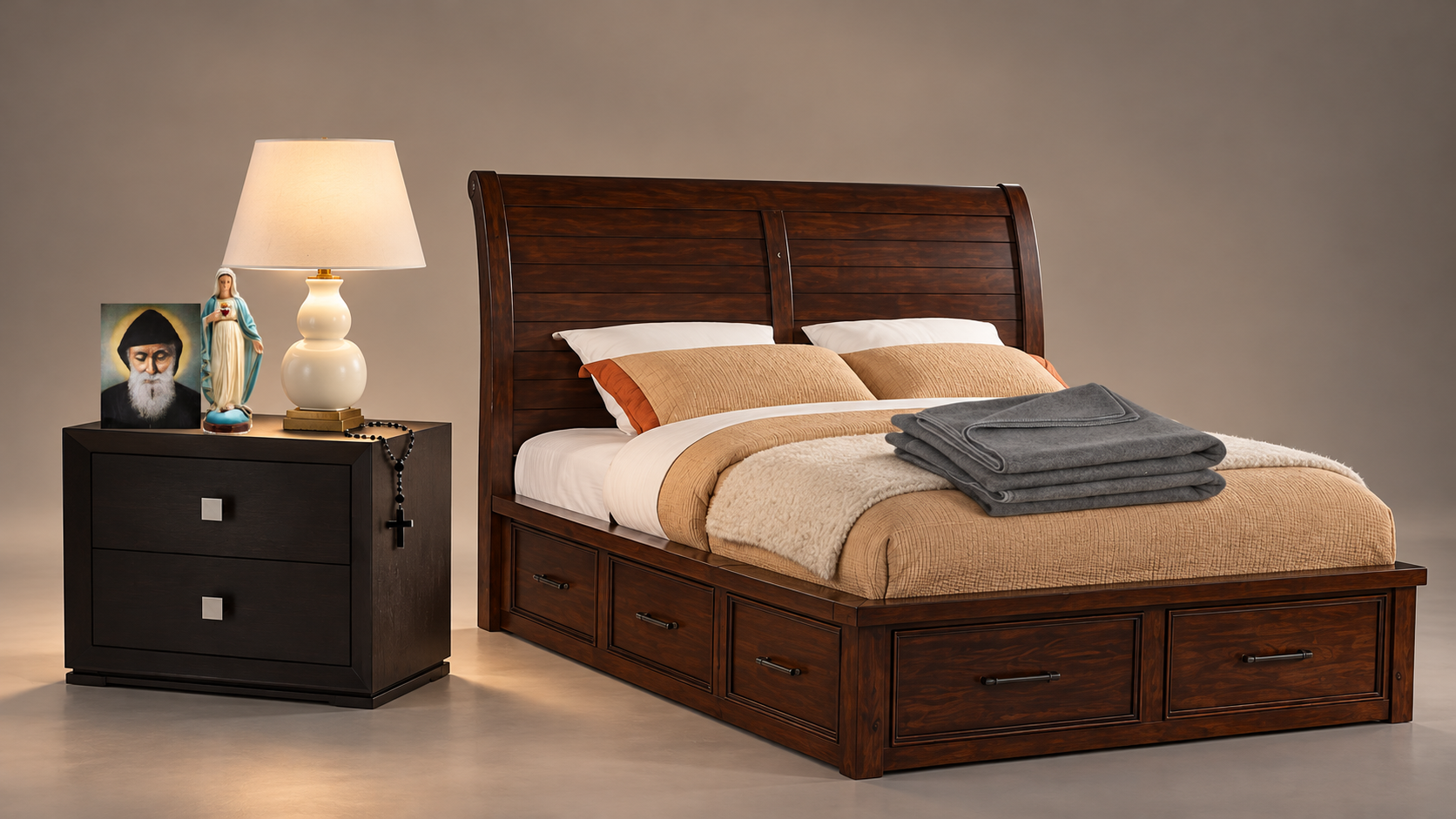 Interpretive display of dark timber furniture, a cream lamp, devotional objects and grey blankets.